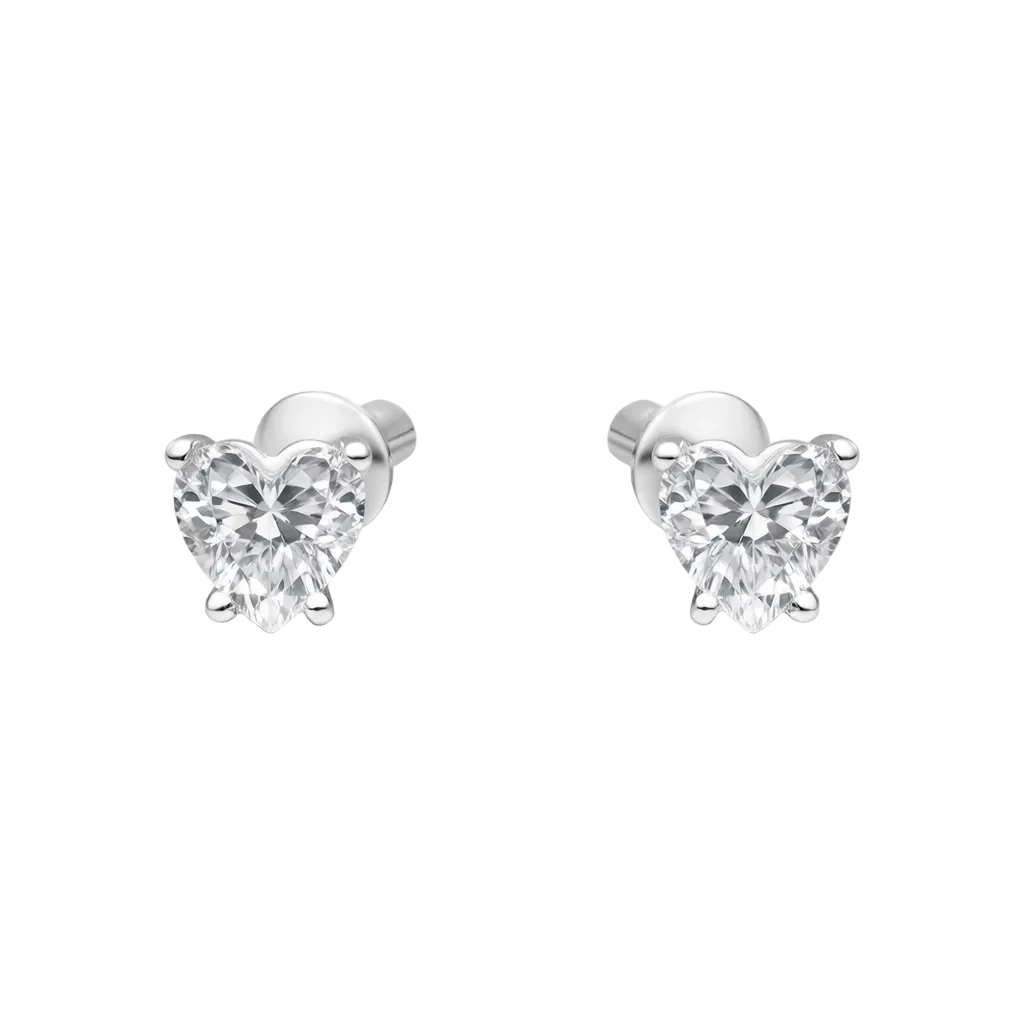 "Aros de corazón en plata ley 925 con circón central de 4mm sobre fondo blanco."